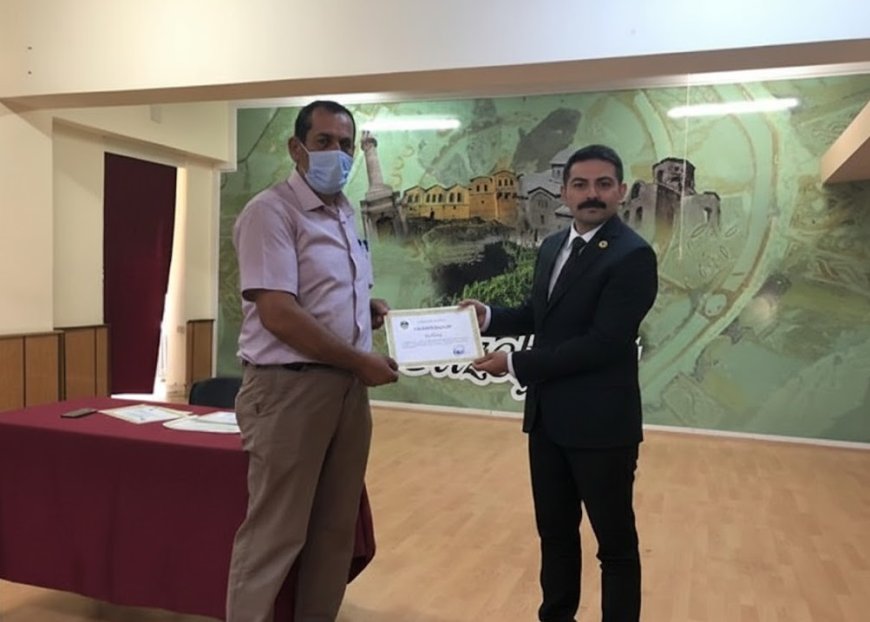 Muhtarımız Sn. Yusuf Kalkan’a Teşekkür Belgesi